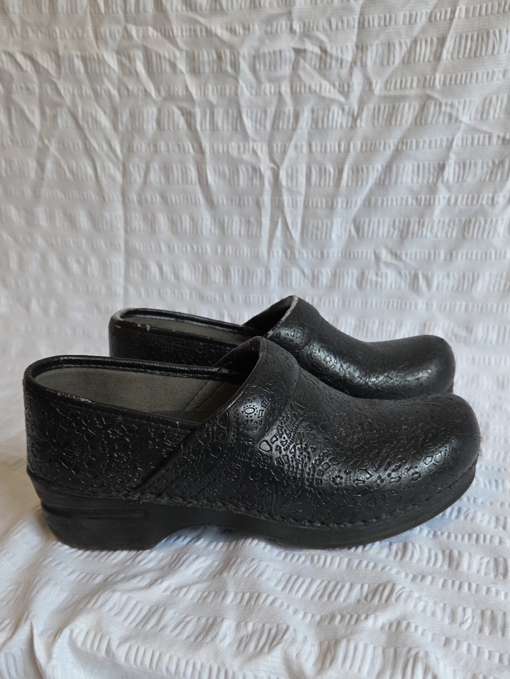 Dansko XP 2.0 Black Floral Tooled Clogs